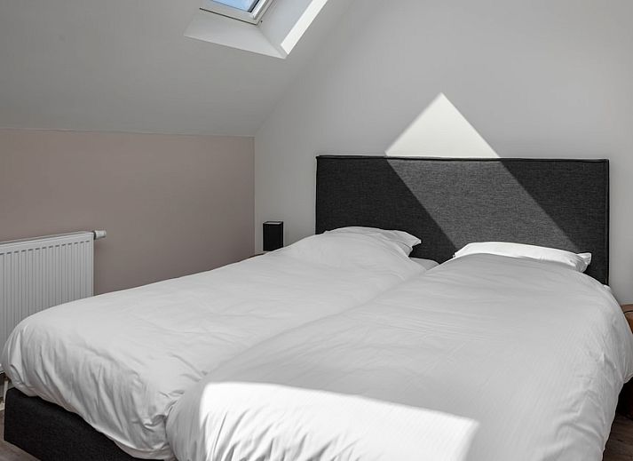 Modern living room of Luxury Villa 10 in Wolphaartsdijk, South Beveland, with comfortable sitting area and stylish dining area in vacation home.