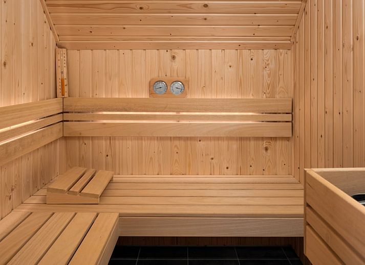 Stylish sitting area in Luxury Villa 10, vacation home in Wolphaartsdijk, South Beveland, Zeeland with modern decor and natural light.