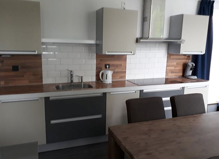 Vakantiehuisje in Wolphaartsdijk met ruime tuin in Zuid-Beveland, Zeeland voor een ontspannen verblijf.