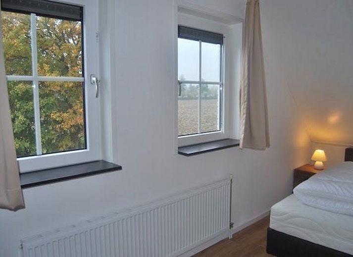 Luxe buitenruimte van VZ1072 vakantiehuis in Wolphaartsdijk met uitzicht op de natuur