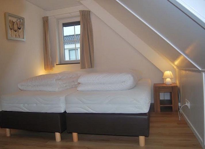 Comfortabele loungehoek bij VZ1072 vakantiehuis in Wolphaartsdijk, ideaal voor relaxen in Zeeland