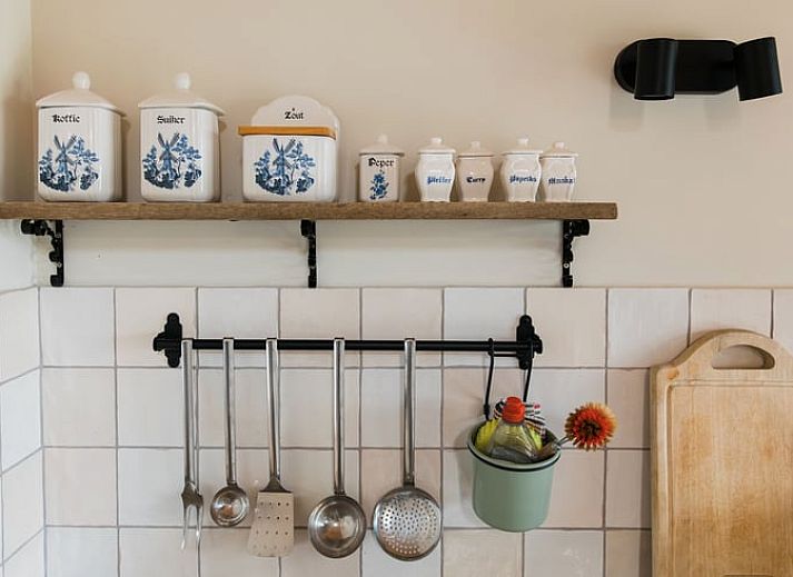 Zijaanzicht van Vakantiehuis in Lewedorp, Zuid-Beveland met karakteristieke bakstenen gevel.