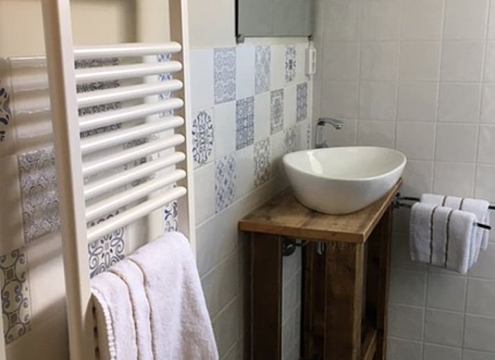 Uitzicht vanuit slaapkamer Huisje in Stolwijk, vakantiehuis in Alblasserwaard met landelijke charme.