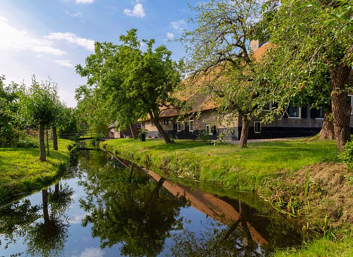 Sunrise over the landscape at Cottage in Stolwijk, vacation home in Alblasserwaard, South Holland.