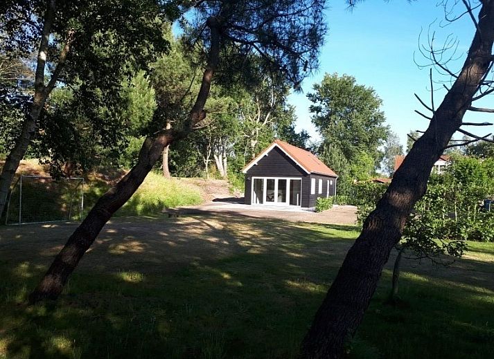 Enjoy the peace and quiet on the terrace of vacation home Vrijheid in Ouddorp, Goeree-Overflakkee, South Holland.