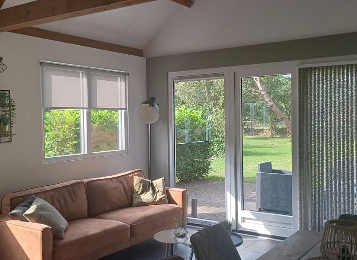 Enjoy the peace and quiet on the terrace of vacation home Vrijheid in Ouddorp, Goeree-Overflakkee, South Holland.