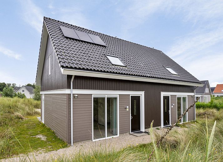 Reihenhaus in Ouddorp, Ferienhaus in Goeree-Overflakkee, Sdholland mit malerischem Blick auf das Wasser und die umliegende Natur.
