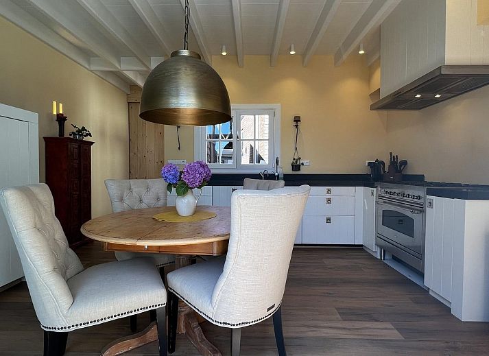 Comfortabele zithoek op het terras van VZ1114 Vakantieappartement in Ouddorp.