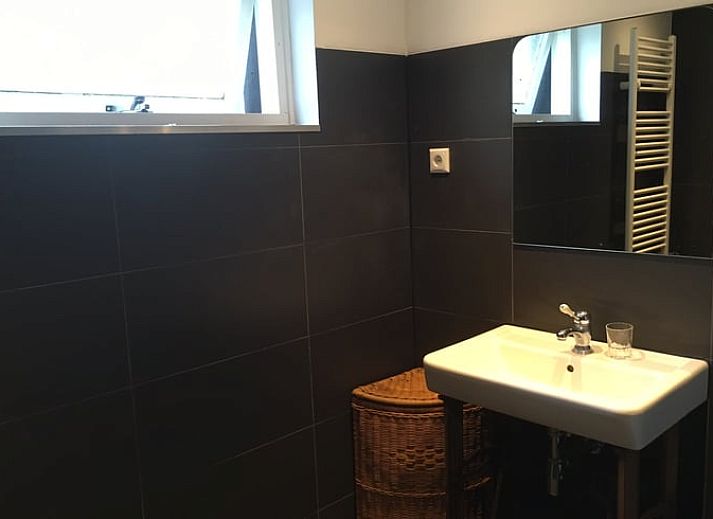 Uitzicht op de kust bij Vakantiehuis in Ouddorp, Goeree-Overflakkee, Zuid-Holland.