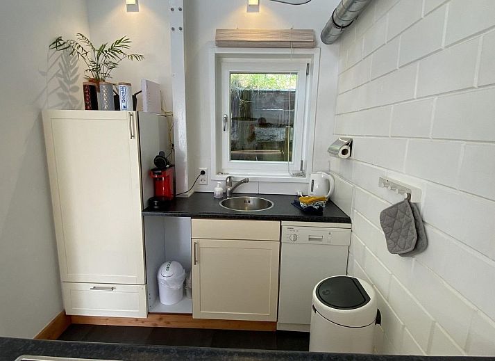 Gemuetliche Sitzecke auf der Terrasse von VZ991 Vakantiewoning in Ouddorp, Suedholland.