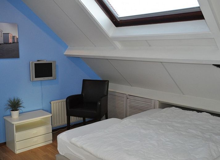 Collage van Vakantiehuis Ouddorp, met strandhuis thema en interieur in Goeree-Overflakkee.