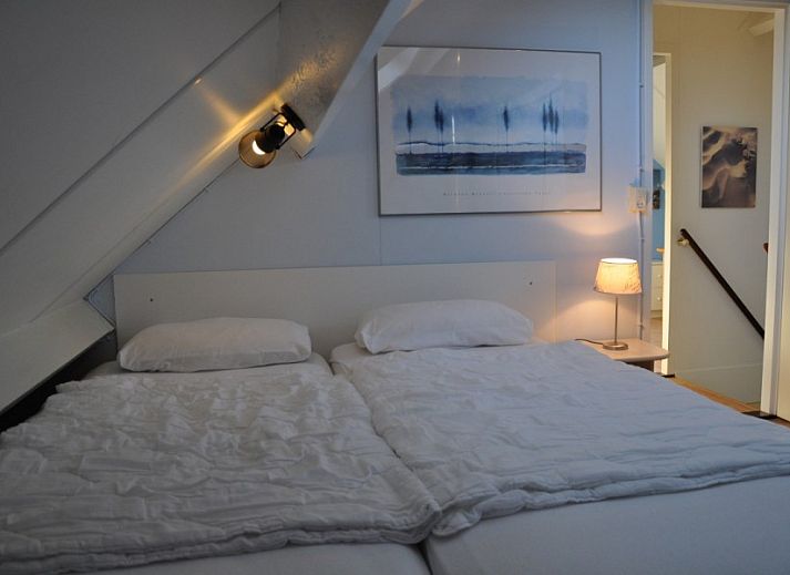 Collage van Vakantiehuis Ouddorp, met strandhuis thema en interieur in Goeree-Overflakkee.