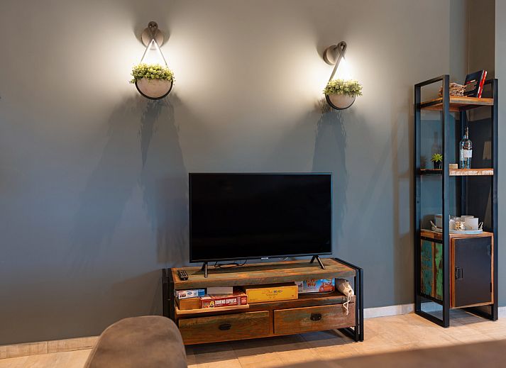 Bedroom in ZH416 vacation home, Ouddorp, Goeree-Overflakkee, with rustic wooden furniture.