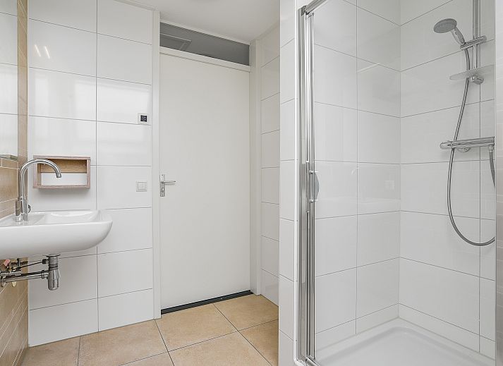 Cozy sitting area in Strand Resort Ouddorp Duin, 10-person villa in Ouddorp, South Holland.