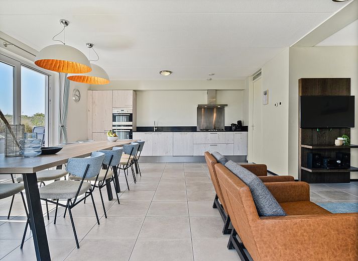 Comfortable living room with corner sofa in Strand Resort Ouddorp Duin, vacation home in Ouddorp.