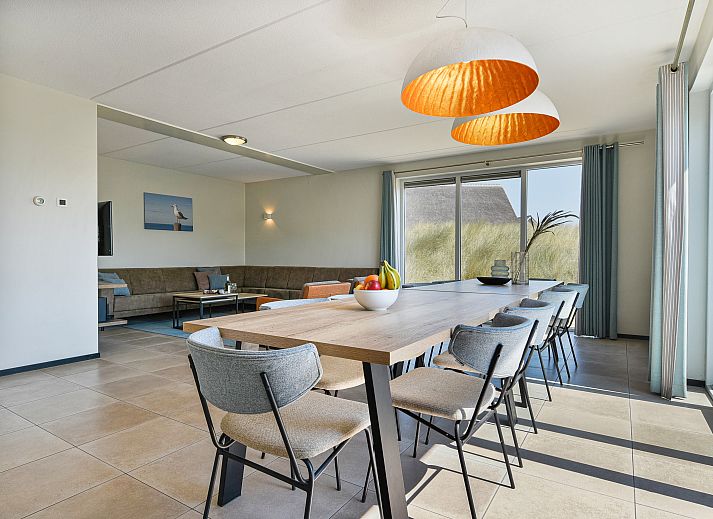 Stylish coffee table with wine in Strand Resort Ouddorp Duin, 10-person villa in Ouddorp.