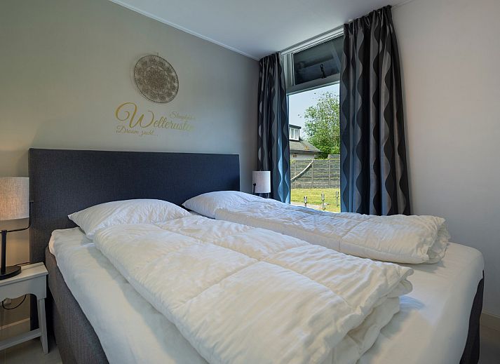 Luxe tuinmeubilair op het terras van Vakantiewoning De Toekomst 107 'Siesta' in Ouddorp, Zuid-Holland.