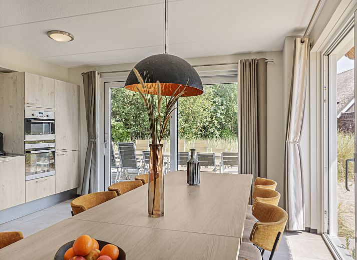 Cozy indoor area of Strand Resort Ouddorp Duin, a 12-person villa in Ouddorp, Goeree-Overflakkee, South Holland.