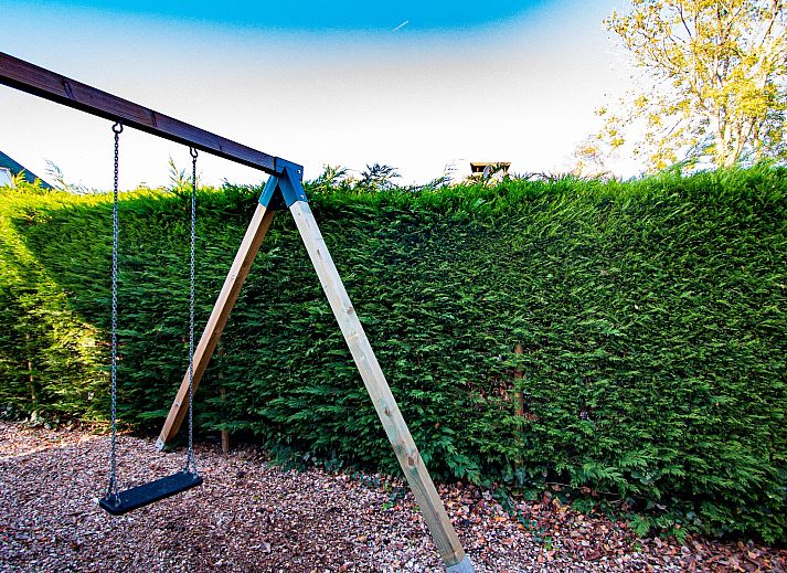 Offene Kueche und Wohnzimmer des Ferienhauses De Toekomst 126 Beachgarden in Ouddorp, ideal zum Entspannen.