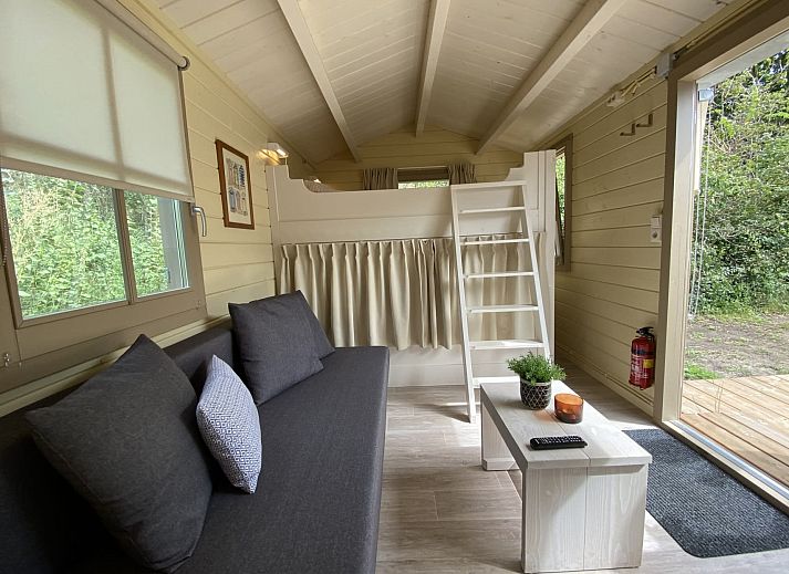 Camping chalet the Albatros Plus in Ouddorp, Goeree-Overflakkee, South Holland with spacious veranda and green surroundings.