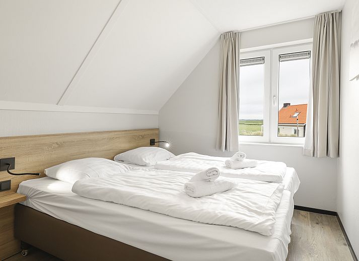 Gemuetliches Wohnzimmer im Strand Resort Ouddorp Duin, 6-Personen-Villa Zeeduin, Ouddorp. Gemuetliche Sitzecke mit Blick auf die Duenen.