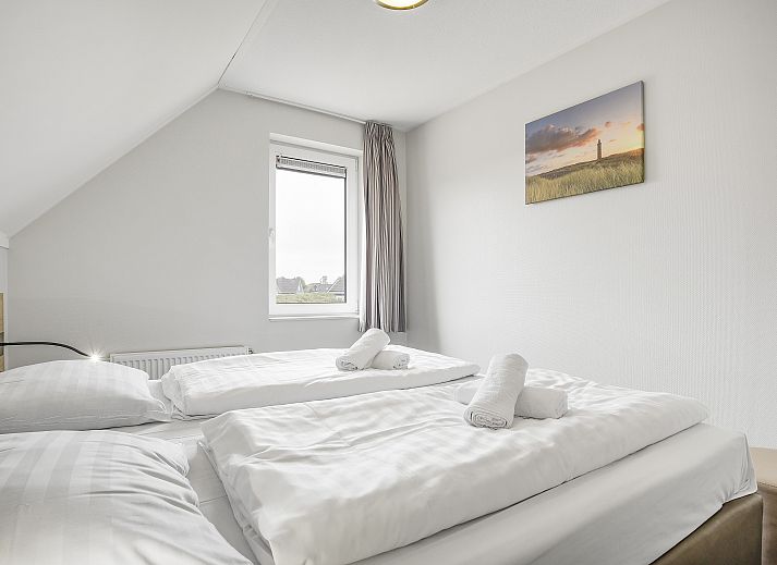 Gezellige zithoek in de villa van Strand Resort Ouddorp Duin, Zuid-Holland.