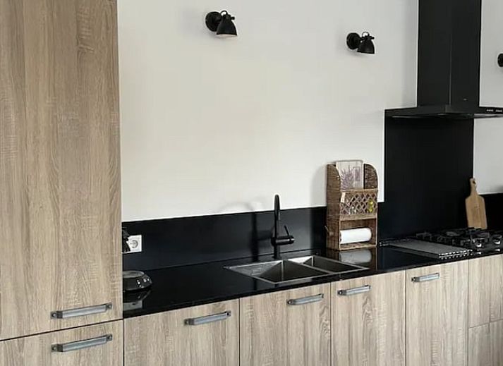 Terrace of Cottage in Dirksland vacation home in South Holland with comfortable outdoor seating.