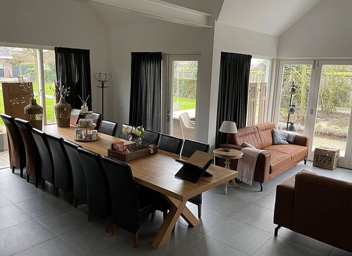 Terrace of Cottage in Dirksland vacation home in South Holland with comfortable outdoor seating.