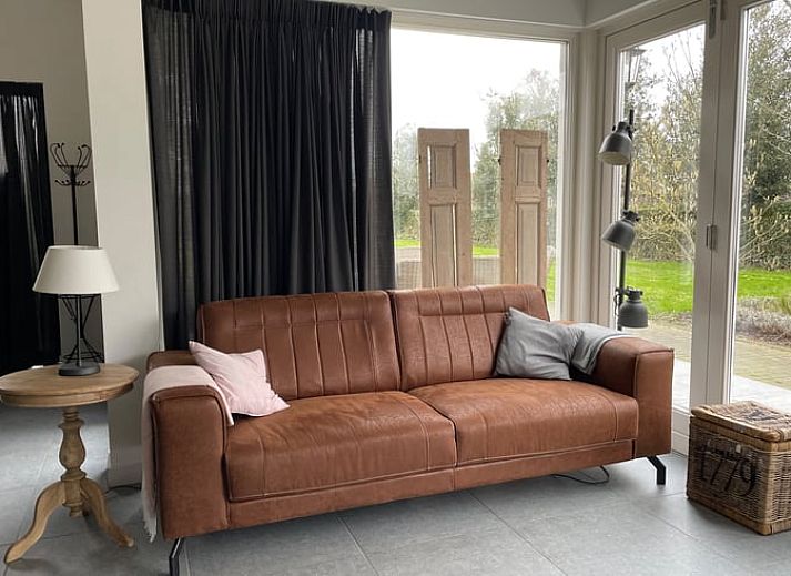 Sunset at the terrace of Huisje in Dirksland vacation home in Goeree-Overflakkee.