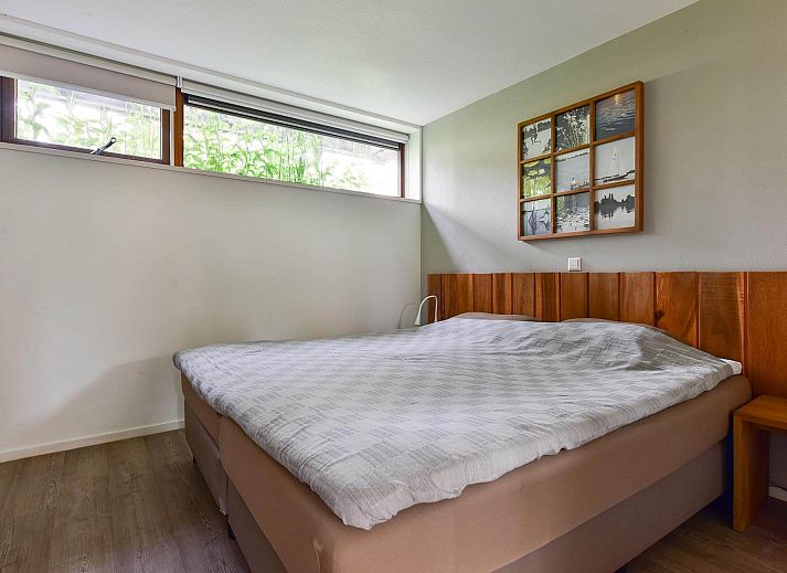 Spacious terrace of the Detached house in Reeuwijk, ideal vacation home in South Holland for outdoor dining and enjoying nature.