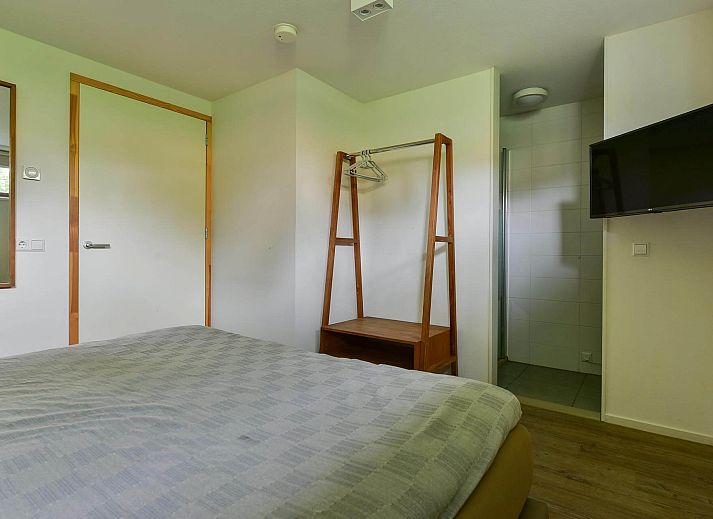 Spacious terrace of the Detached house in Reeuwijk, ideal vacation home in South Holland for outdoor dining and enjoying nature.