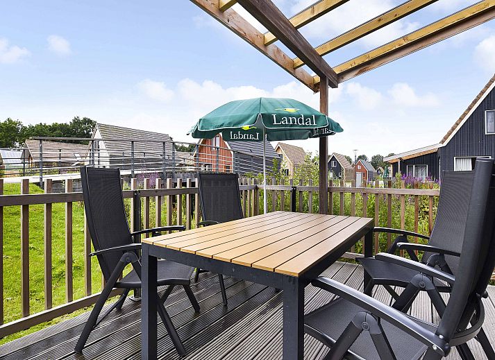 Comfortabele woonkamer in De Reeuwijkse Plassen 4-persoons kinderwoning, vakantiehuis in Reeuwijk.