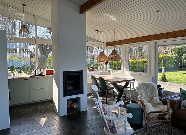 Cozy living room of Holiday home in Reeuwijk overlooking the water, ideally located in the Green Heart of South Holland.