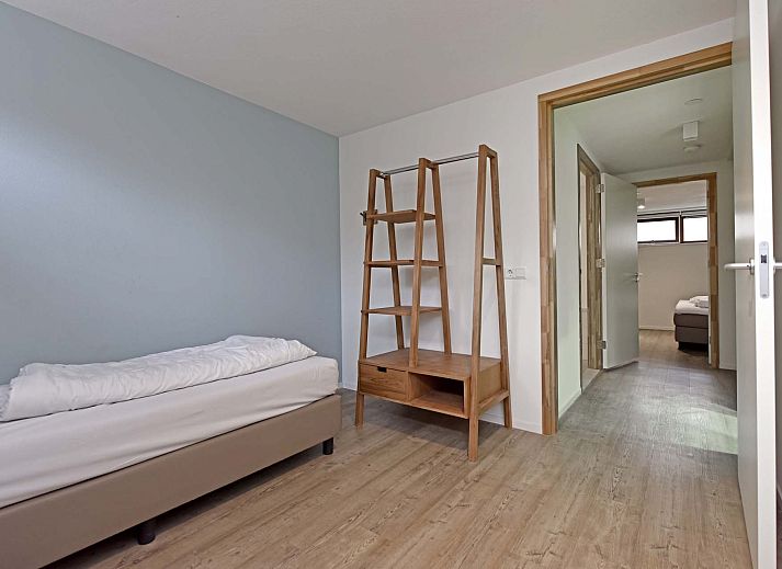 Bright living room of Detached house in Reeuwijk, vacation home in the Green Heart, South Holland, with modern furnishings and views of terrace.