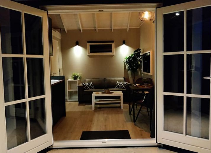 Sunny terrace at Holiday Home in Nieuwveen, Green Heart, South Holland.