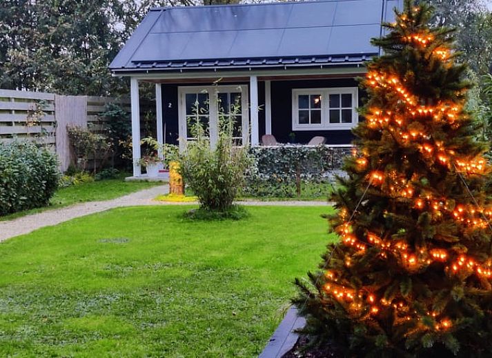 Offene Tueren zum Garten in Cottage in Nieuwveen, Ferienhaus in Green Heart, Suedholland.