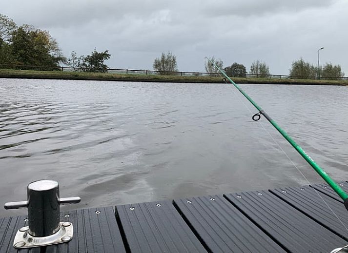 Rustgevend uitzicht op de omgeving van Vakantiehuis in Woerdense Verlaat met ochtendnevel.
