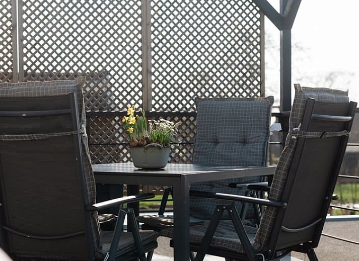 Gezellige binnenruimte van Huisje in Bodegraven, moderne zithoek in een bed and breakfast in het Groene Hart.