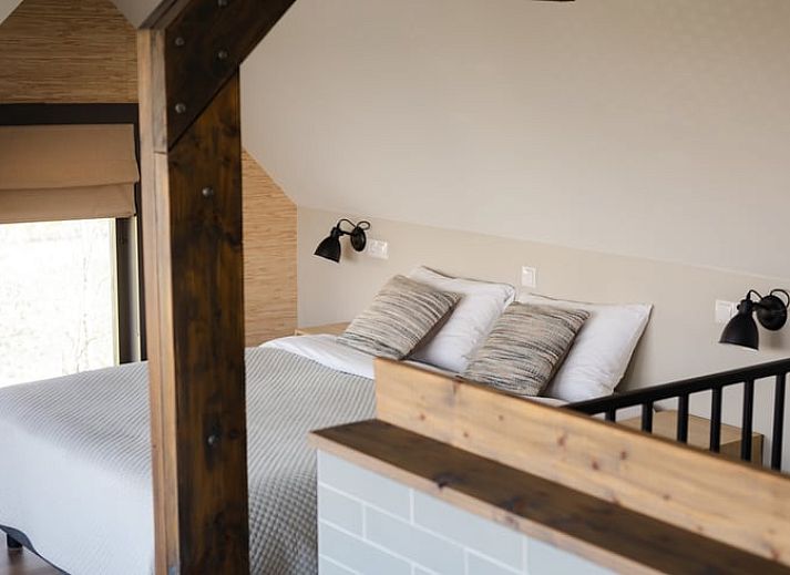 Gezellige woonkamer in Vakantiehuisje in Bodegraven, perfect voor ontspanning in het Groene Hart van Zuid-Holland.