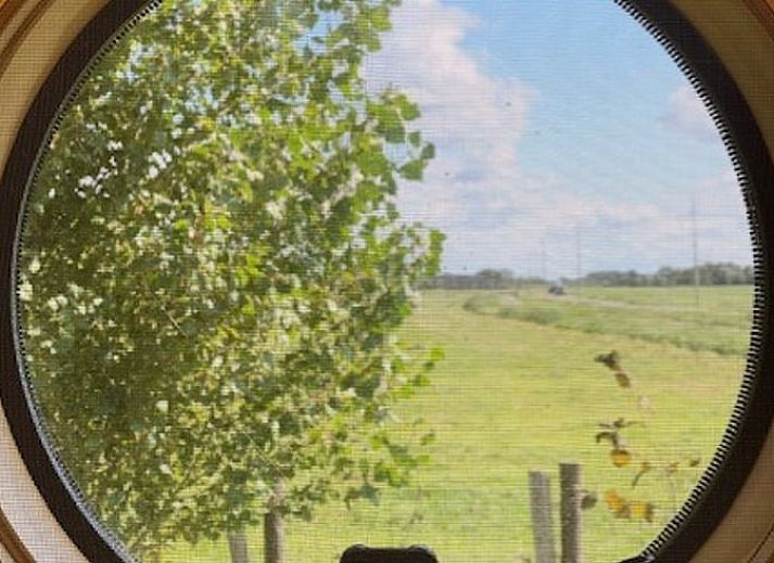 Indoor room with garden view in Holiday home in Oud Ade, Green Heart.