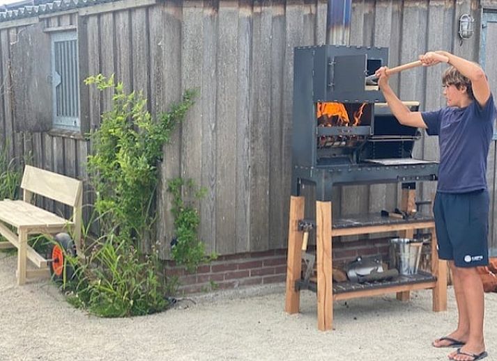 Indoor room with garden view in Holiday home in Oud Ade, Green Heart.