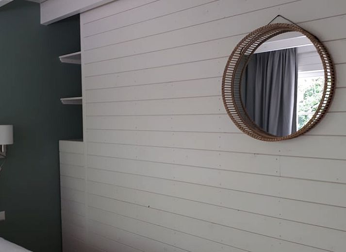 Vacation home in Hazerswoude-Rijndijk with wooden veranda and garden view, located in the Green Heart of South Holland.