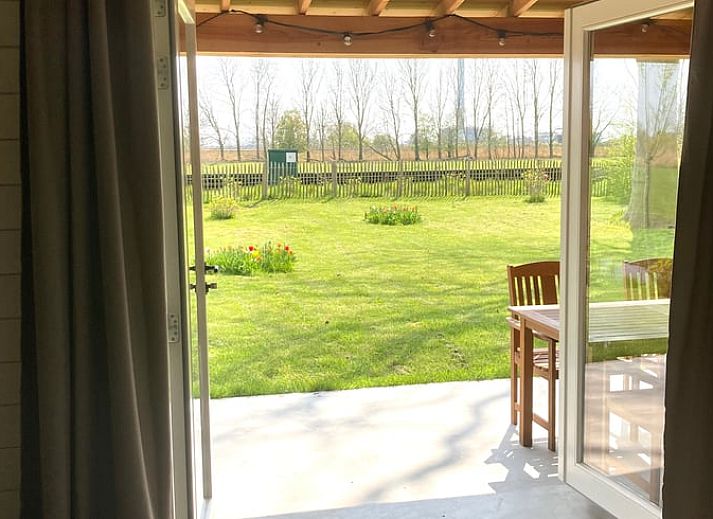 Cozy interior of vacation home in Hazerswoude-Rijndijk, Green Heart, with wooden interior and dining area in South Holland.