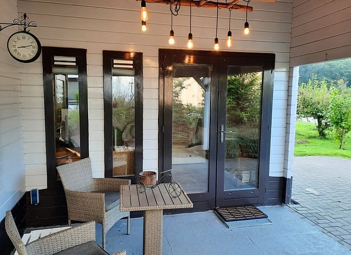 Cozy porch of Huisje in Lisse, vacation home on the North Sea coast in South Holland.