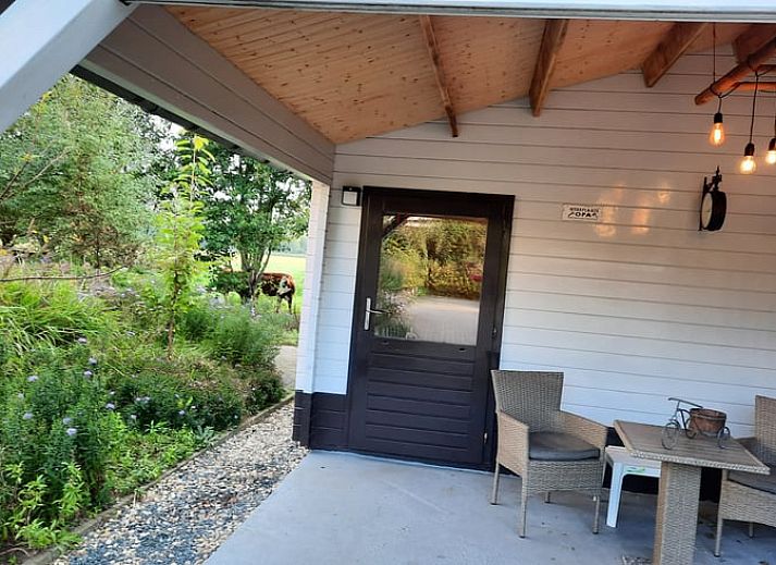 Cozy porch of Huisje in Lisse, vacation home on the North Sea coast in South Holland.