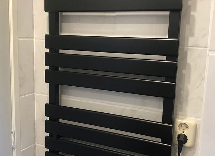 Entrance of Huisje in Lisse, charming vacation home surrounded by nature in South Holland.