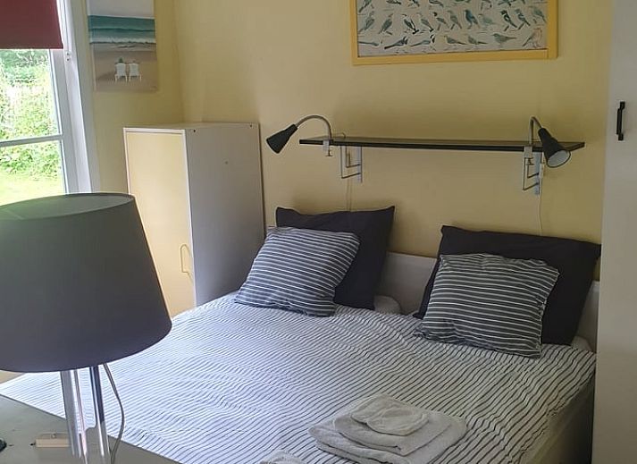 Cozy garden at Holiday home in Oostvoorne, ideal for relaxation in Voorne Putten.