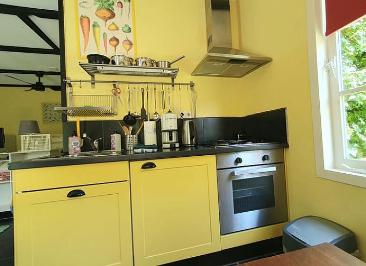 Cozy garden at Holiday home in Oostvoorne, ideal for relaxation in Voorne Putten.