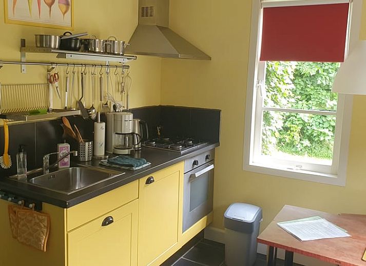 Cozy garden at Holiday home in Oostvoorne, ideal for relaxation in Voorne Putten.