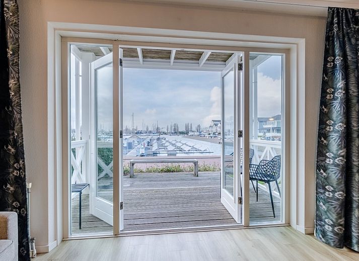 Enjoy the view from the terrace of CB4 Comfort bungalow in Hellevoetsluis, South Holland, with a beautiful view of the marina.